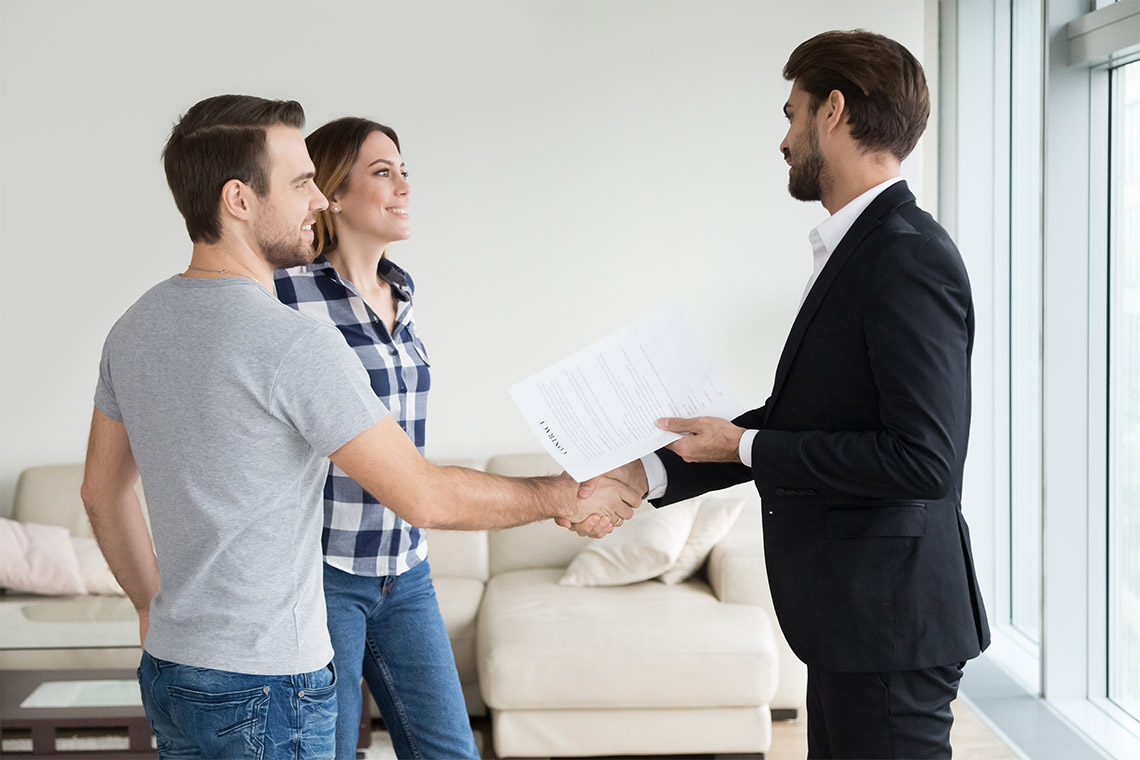 A Landlord And Tenants Shake Hands